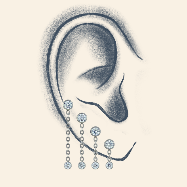 An ear featuring an assortment of our Titanium Dangles
