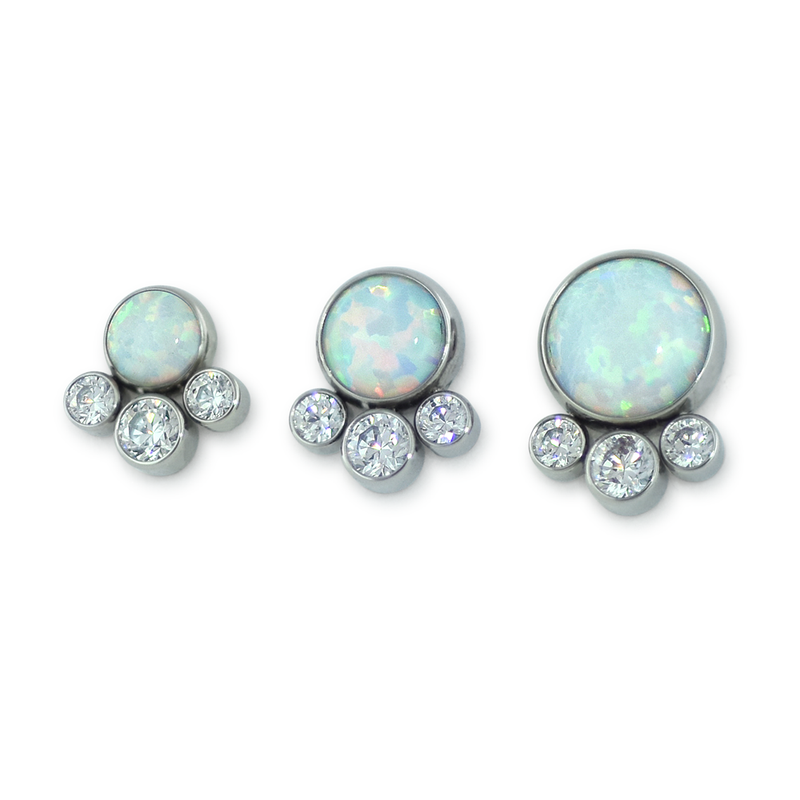 A 3mm, 4mm, and 5mm Threadless Titanium Bezel Set Cabochon with 1.5mm and 2mm Cubic Zironcia faceted gems underneath.