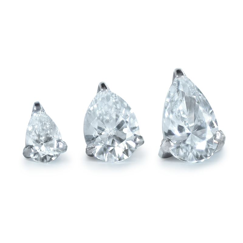 A 3mm, 4mm, and 5mm threadless titanium prong set pear cut gem end with cubic zirconia gems