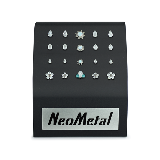 20 piece black acrylic gem display with NeoMetal logo featuring Pear Gem ends, Flower gem ends, sun cabochon ends, and a pear fan cluster.