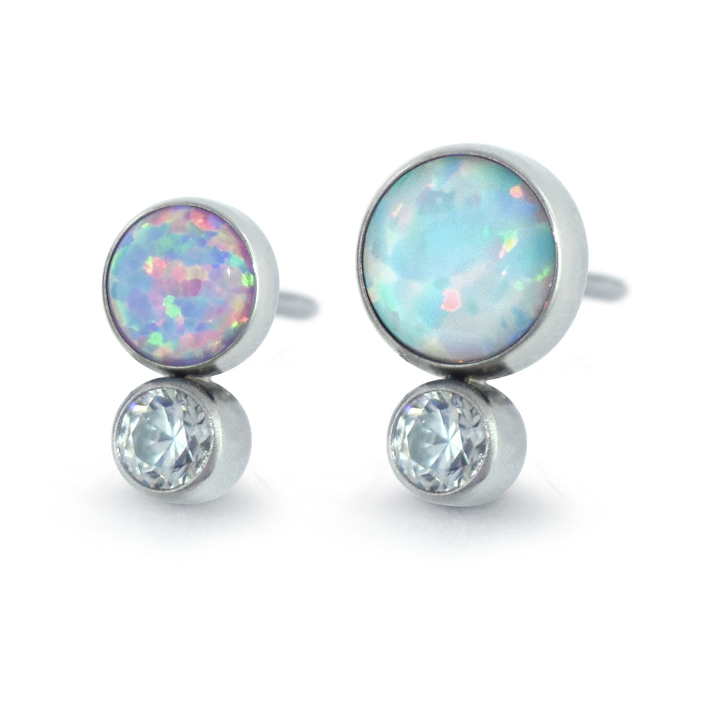Two sizes of threadless titanium bezel set 2-gem clusters featuring White Opal and Peacock Cabochons and Cubic Zirconia Gems