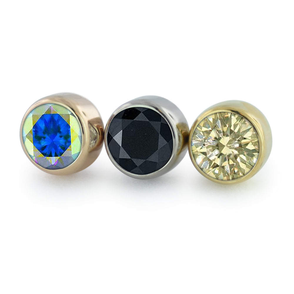 3 18K gold bezel set gem ends with yellow gold, rose gold, and white gold settings and Aurora Borealis, Black, and Champagne faceted gems