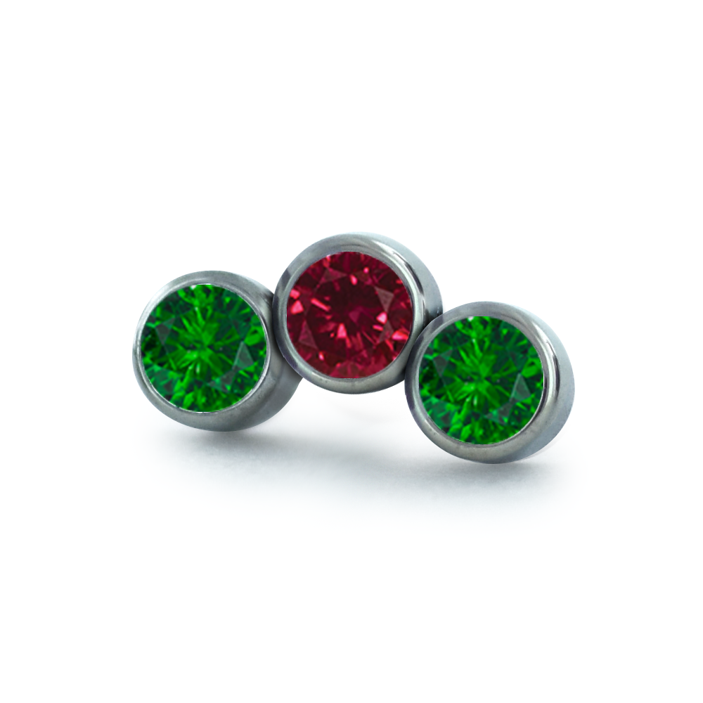 A 3-piece curved cluster featuring 1.5mm Emerald and Ruby Faceted Gems in threadless titanium bezel settings