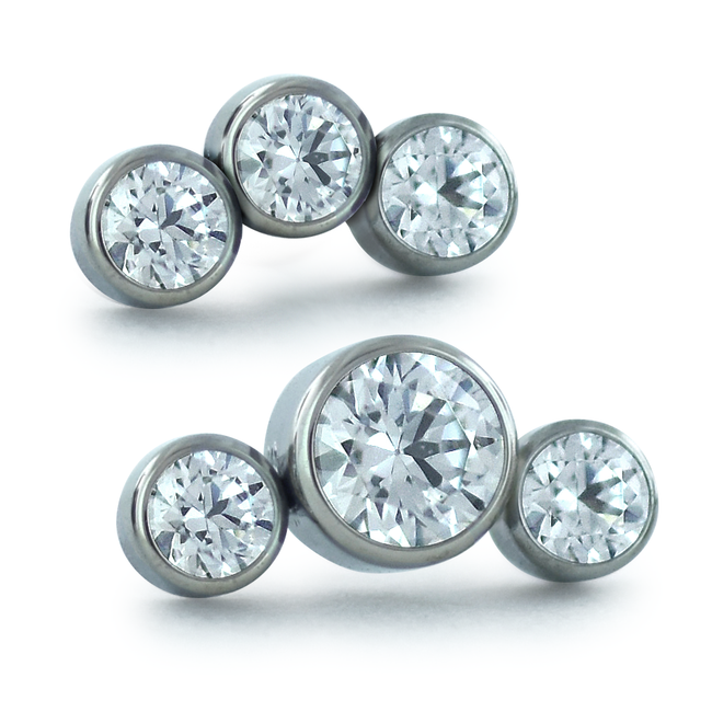 A 3-piece curved cluster featuring 1.5mm Cubic Zirconia Gems in threadless titanium bezel settings and A 3-piece curved cluster featuring 1.5mm and 2.5mm Cubic Zirconia Gems in threadless titanium bezel settings