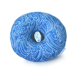 Blue Piercing Pillow with white wave outlines and simulated ear