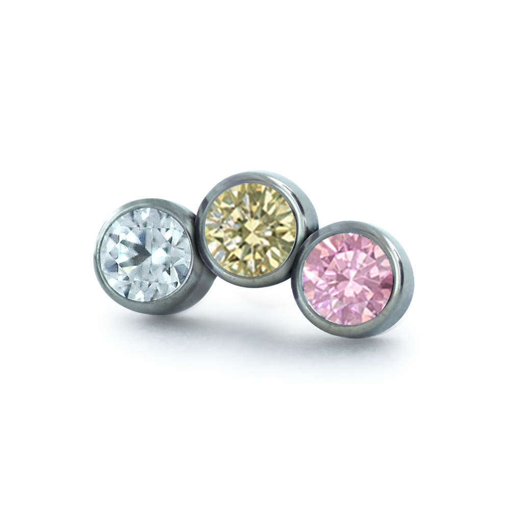 Pink/champagne color option for the three pieced petite curve bezel set cluster with faceted gems