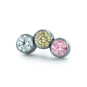 Pink/champagne color option for the three pieced petite curve bezel set cluster with faceted gems