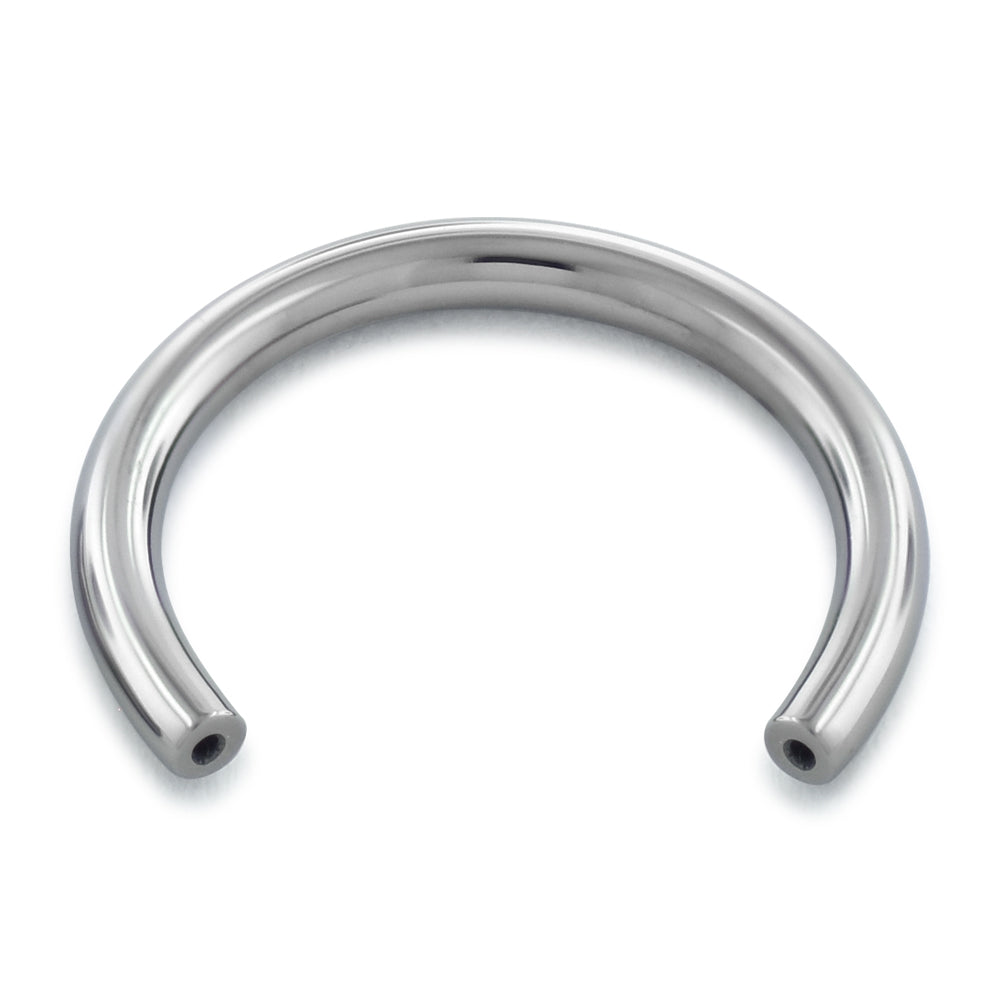 A threadless titanium circular barbell with no ends
