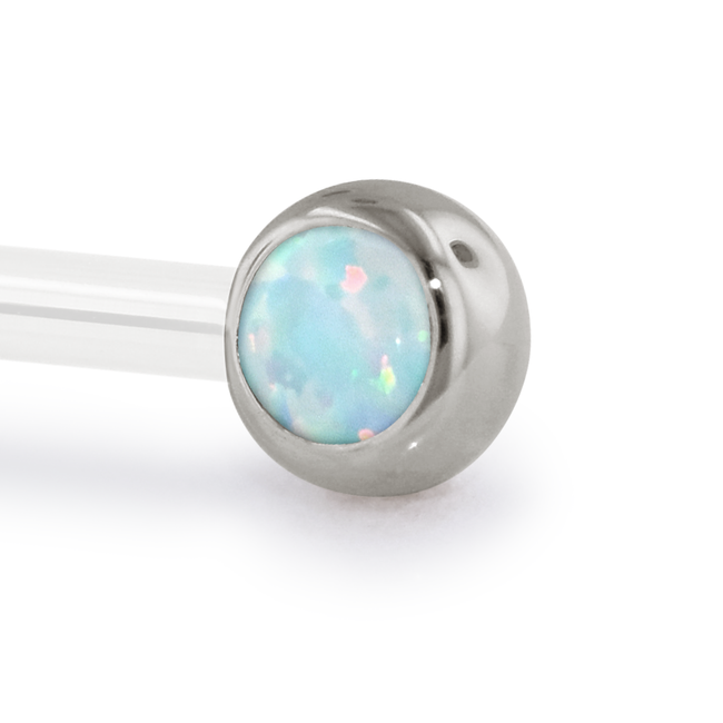 A 12 Gauge side gem in White Gold with a White Opal Cabochon