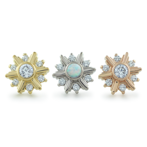 18K yellow gold, white gold, and rose gold settings with a cubic zirconia or white opal center gem surrounded by 6 smaller cubic zirconia gems