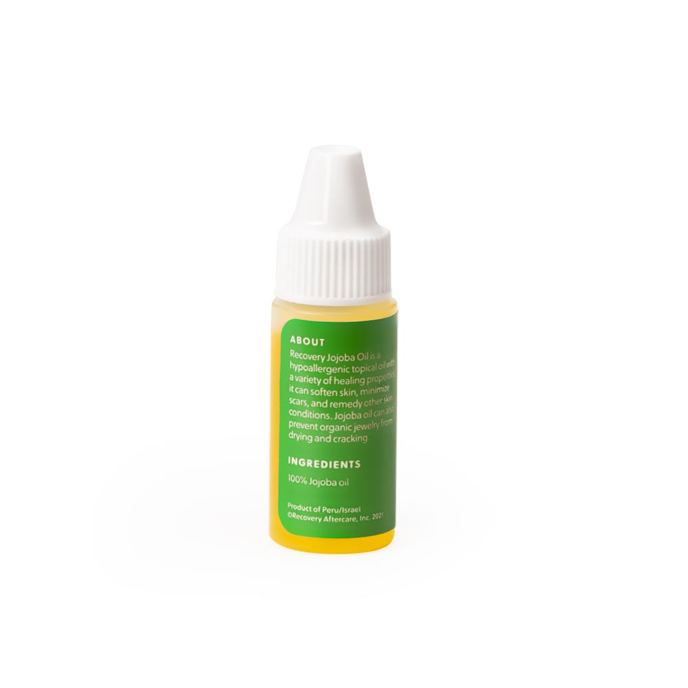 Back of a Recovery Jojoba oil bottle