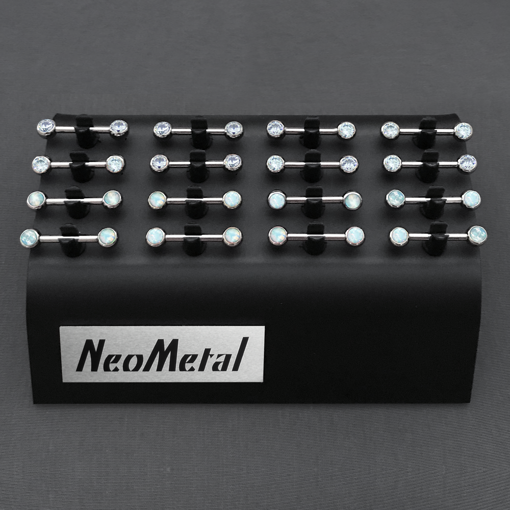 A 16 piece black versi clip display with nipple bars featuring Cubic Zirconia and White Opal Side Gems