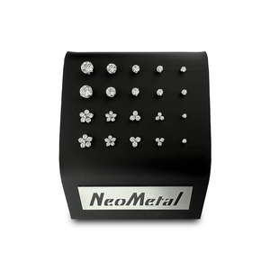 A 20 unit black display case showcasing different sizes of our titanium prong set gem ends with cubic zirconia and different sizes of our titanium flower and trinity gem ends with cubic zirconia