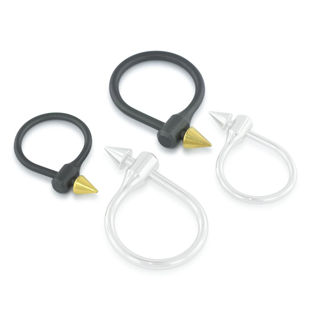 Two sizes of Blackened Titanium Illusion Rings with gold plated cones