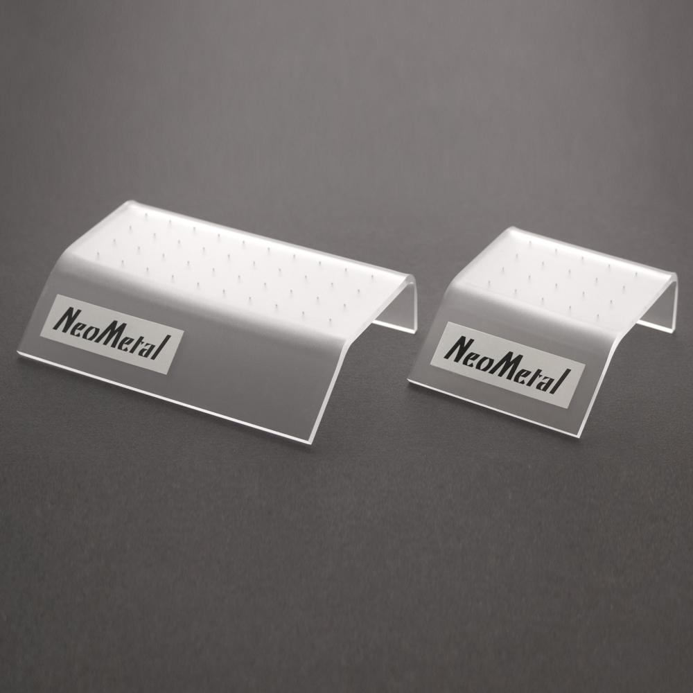 A 40 piece clear acrylic display case with the NeoMetal logo and a 20 piece clear acrylic display case with the NeoMetal logo.